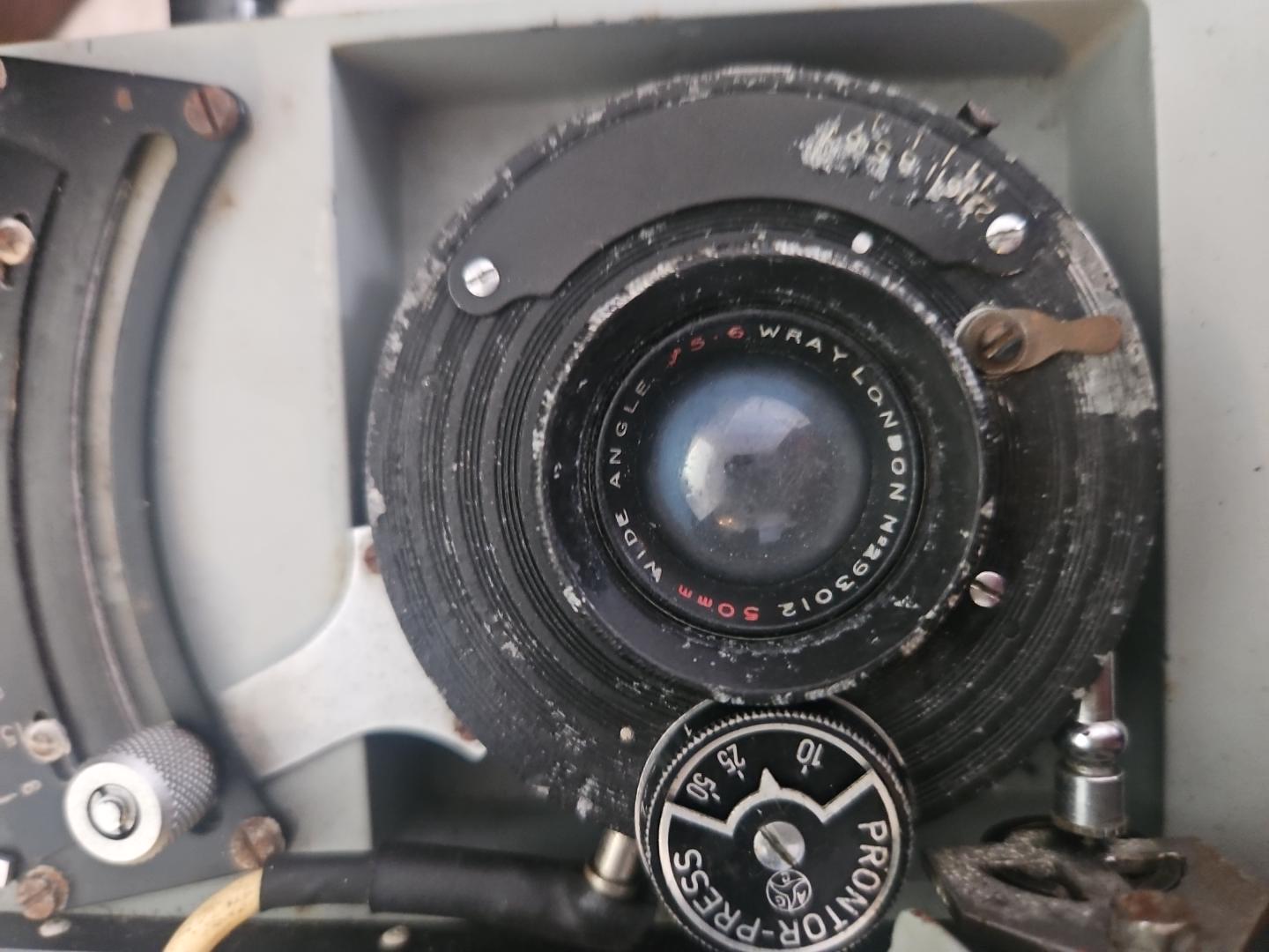 Automatic dial recording camera, crafted by D. Shackman & Sons mahogany case.